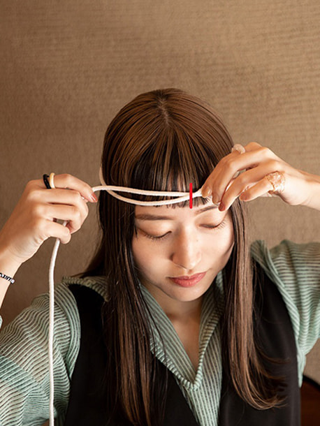 When measuring with a string and ruler