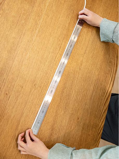 When measuring with a string and ruler